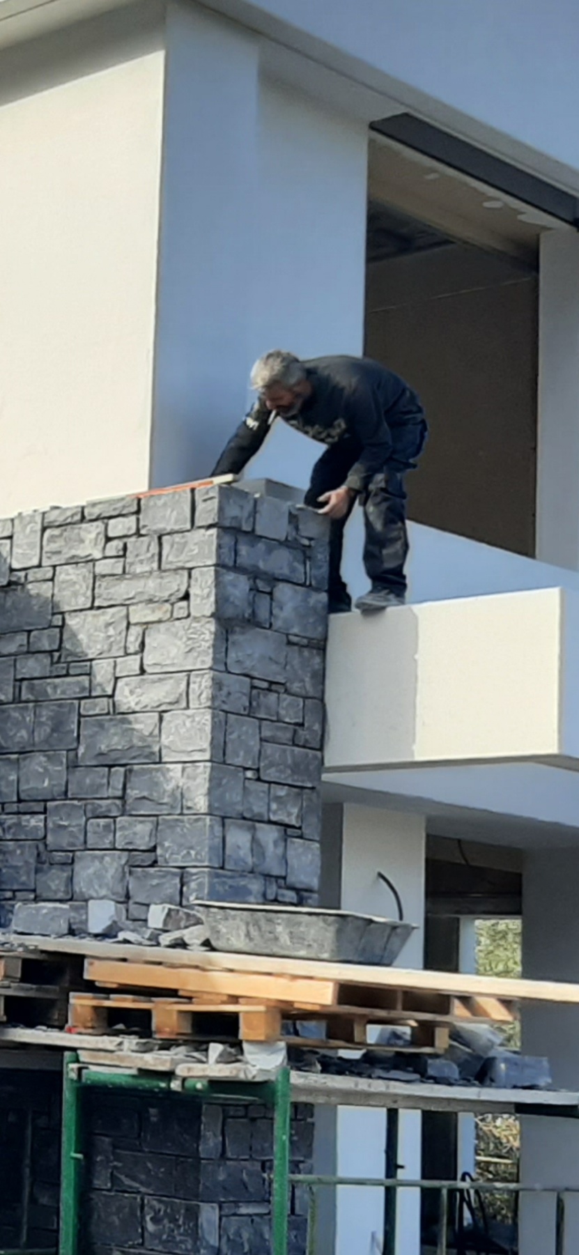 Stonework on the balcony, under construction