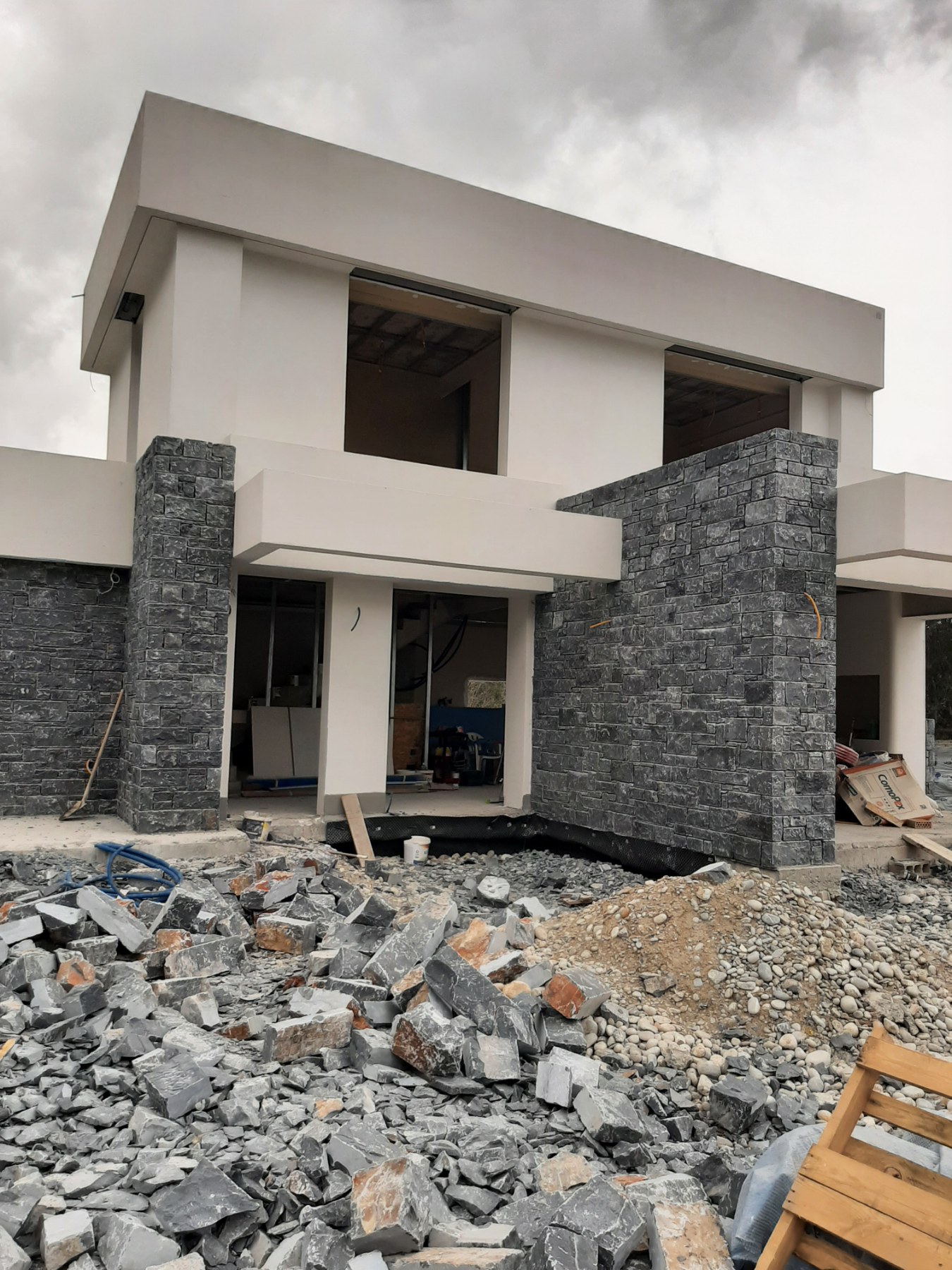 Villa front with stone facade